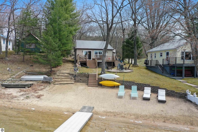 1750 S Schneider St, Lake City, MI 49651 - view of yard featuring stairway and a deck