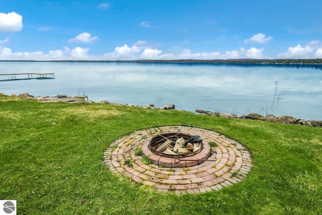 12225 SW Torch Lake Dr SW, Rapid City, MI 49676 - water view featuring an outdoor fire pit