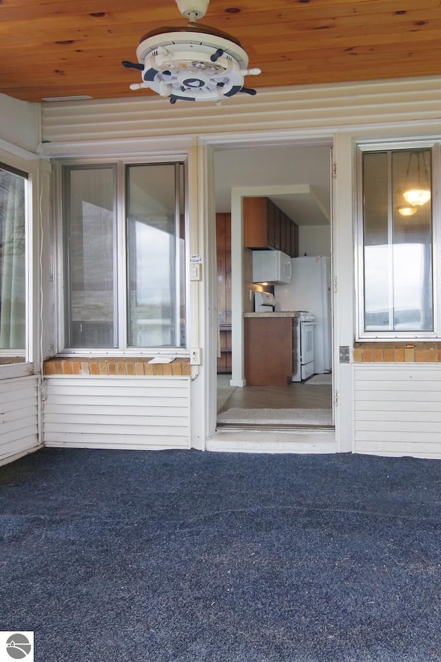 12225 SW Torch Lake Dr SW, Rapid City, MI 49676 - view of exterior entry