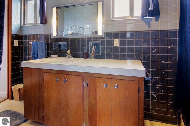 12225 SW Torch Lake Dr SW, Rapid City, MI 49676 - bathroom featuring healthy amount of natural light and vanity