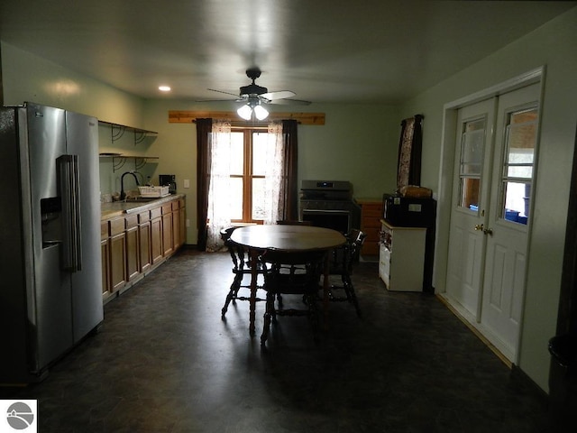 dining room featuring ceiling fan