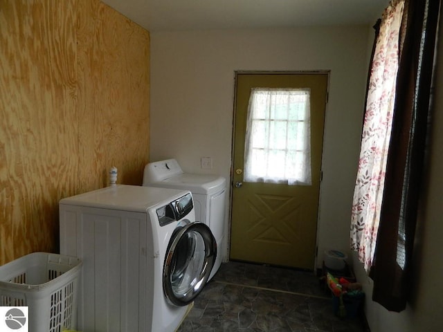 clothes washing area featuring washing machine and dryer