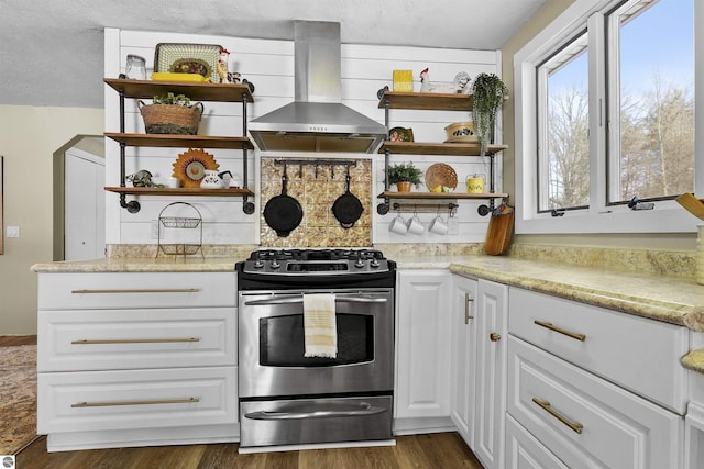 8481 E Houghton Lake Rd, Merritt, MI 49667 - kitchen featuring open shelves, stainless steel gas range, range hood, dark wood-style flooring, and white cabinetry