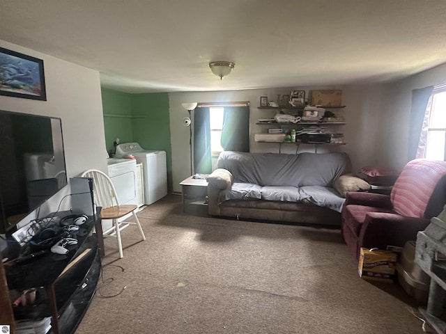 living area featuring independent washer and dryer and carpet floors