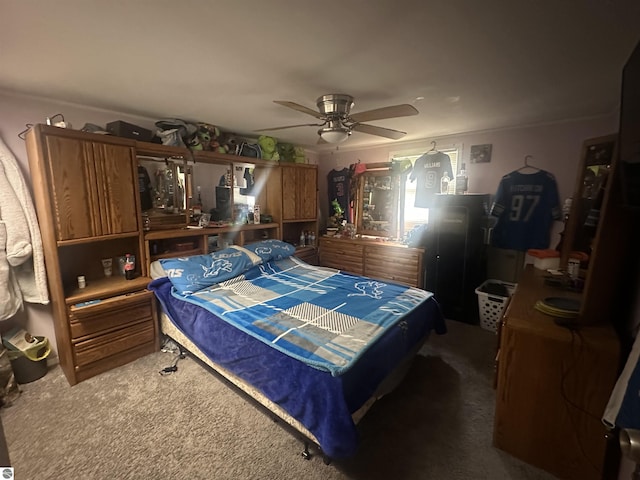 carpeted bedroom featuring a ceiling fan