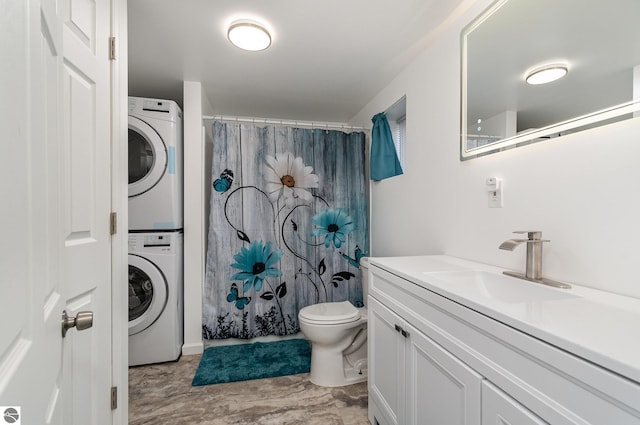 bathroom featuring stacked washer / dryer, toilet, vanity, and a shower with shower curtain