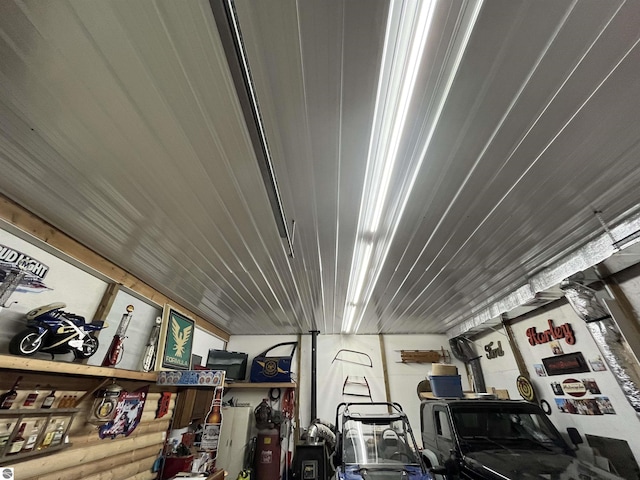 15831 SE M 72, Grayling, MI 49738 - miscellaneous room with a garage