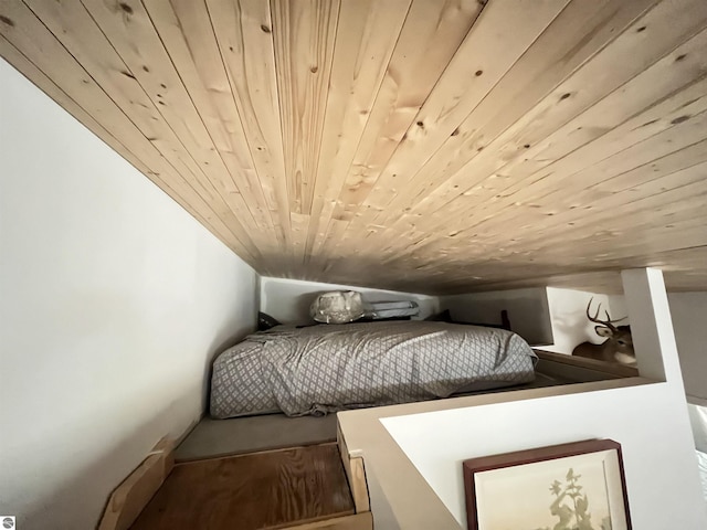 15831 SE M 72, Grayling, MI 49738 - bedroom featuring lofted ceiling and wood ceiling