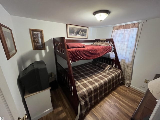15831 SE M 72, Grayling, MI 49738 - bedroom with wood finished floors and baseboards