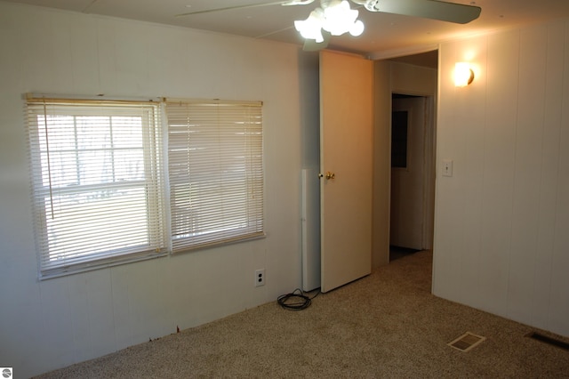 2993 N Ogemaw Trl, West Branch, MI 48661 - carpeted spare room with ceiling fan