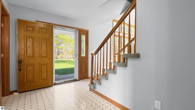 20202 50th Ave, Marion, MI 49665 - foyer entrance with stairway, baseboards, and light flooring