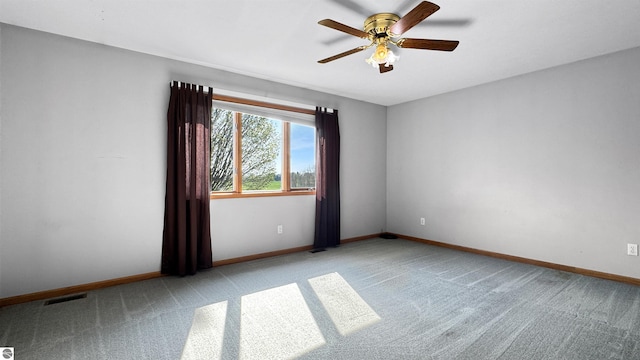 20202 50th Ave, Marion, MI 49665 - unfurnished room with carpet floors, a ceiling fan, and baseboards