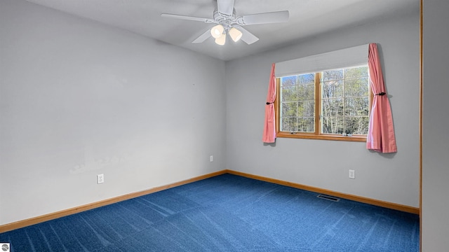 20202 50th Ave, Marion, MI 49665 - empty room with carpet flooring, baseboards, and a ceiling fan