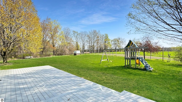 20202 50th Ave, Marion, MI 49665 - view of green lawn with a playground