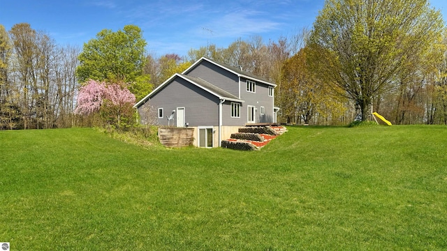 20202 50th Ave, Marion, MI 49665 - view of home's exterior with a yard