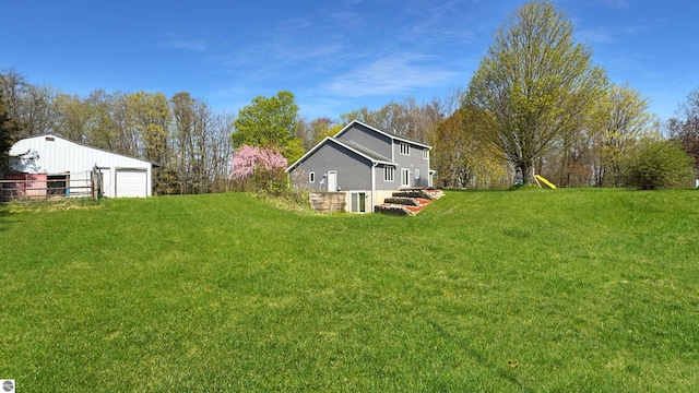 20202 50th Ave, Marion, MI 49665 - view of grassy yard with a garage, an outdoor structure, and an outbuilding