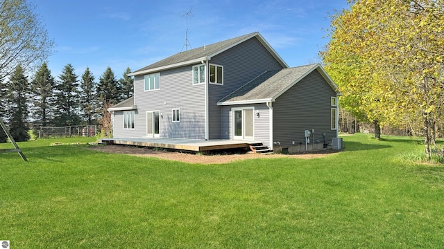20202 50th Ave, Marion, MI 49665 - rear view of property with a deck, a yard, central AC, and a shingled roof