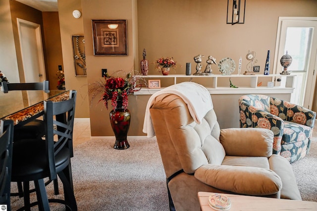 11255 E Fort Rd Unit H1, Suttons Bay, MI 49682 - carpeted living area with baseboards