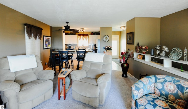 11255 E Fort Rd Unit H1, Suttons Bay, MI 49682 - living room with ceiling fan and light carpet
