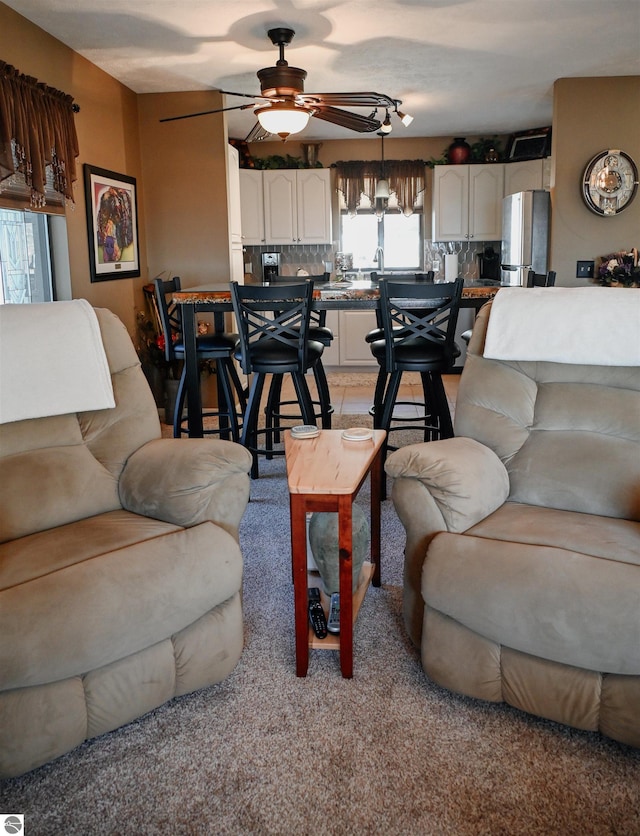 11255 E Fort Rd Unit H1, Suttons Bay, MI 49682 - living room featuring ceiling fan