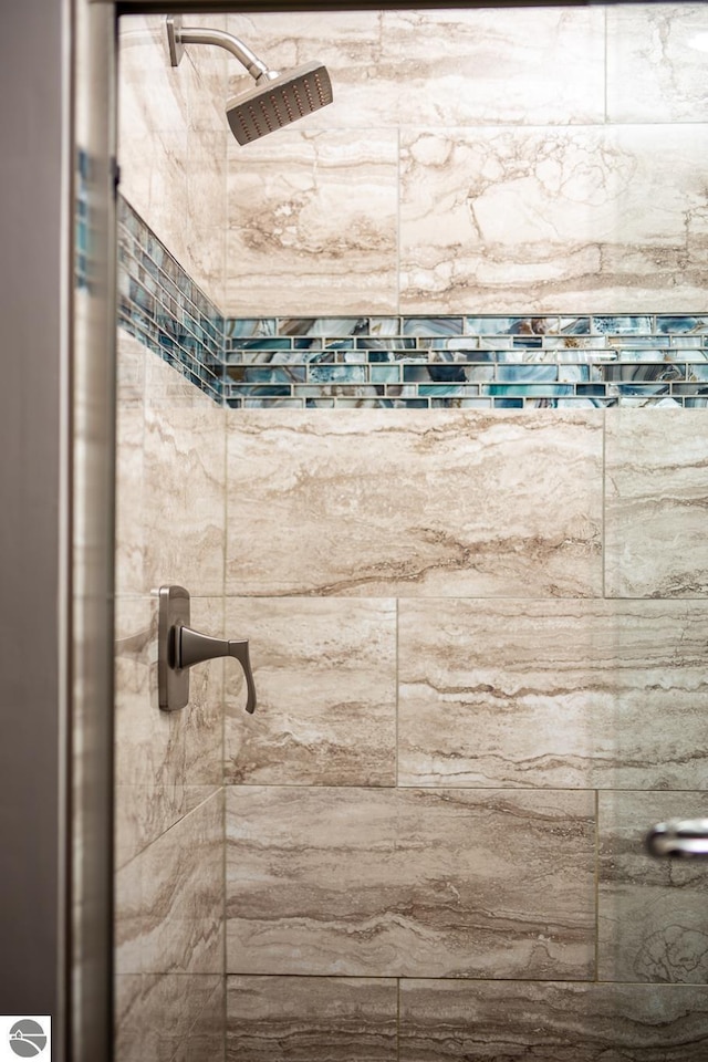 5540 Golf Meadows Dr, Bellaire, MI 49615 - bathroom view of a tile shower