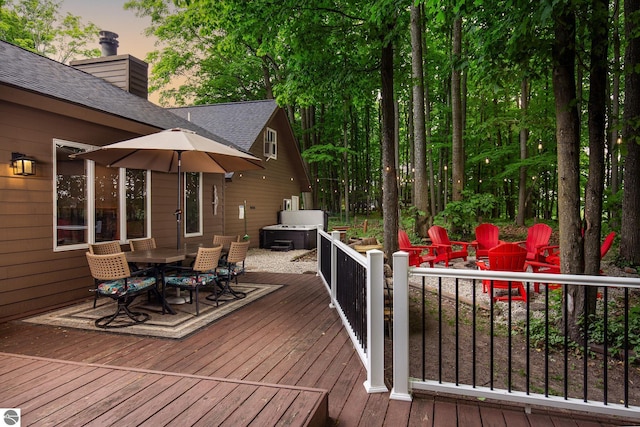 5540 Golf Meadows Dr, Bellaire, MI 49615 - deck featuring outdoor dining area
