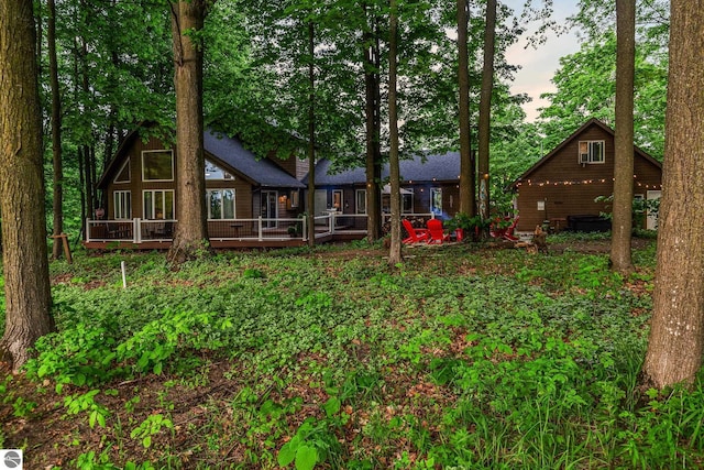 5540 Golf Meadows Dr, Bellaire, MI 49615 - view of yard featuring a deck