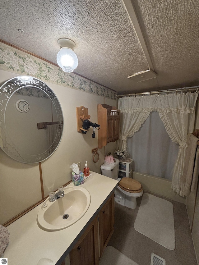 4505 Goldenrod Dr, Traverse City, MI 49685 - full bath featuring a textured ceiling, toilet, vanity, and shower / tub combo with curtain