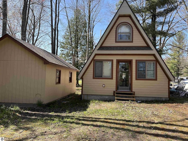 2050 Hiawatha Dr, Cadillac, MI 49601 - view of front of property featuring entry steps
