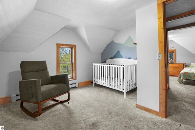 512 Indiana St, Manton, MI 49663 - carpeted bedroom with baseboard heating, lofted ceiling, and baseboards