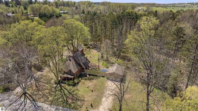 512 Indiana St, Manton, MI 49663 - view from above of property featuring a heavily wooded area