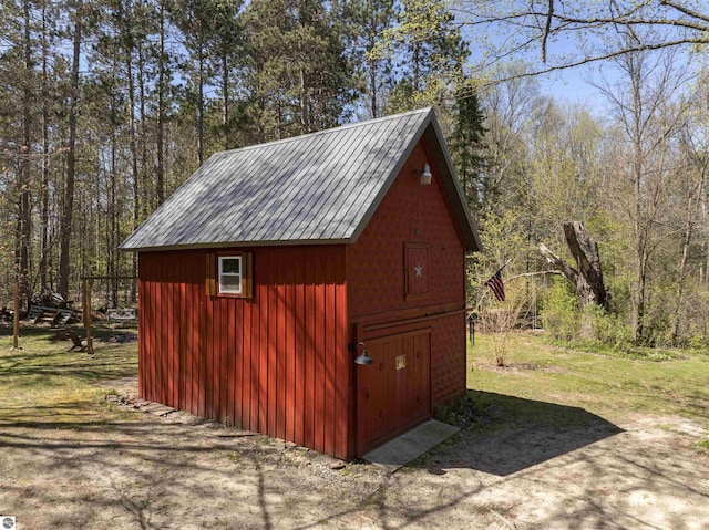 512 Indiana St, Manton, MI 49663 - view of shed with a forest view