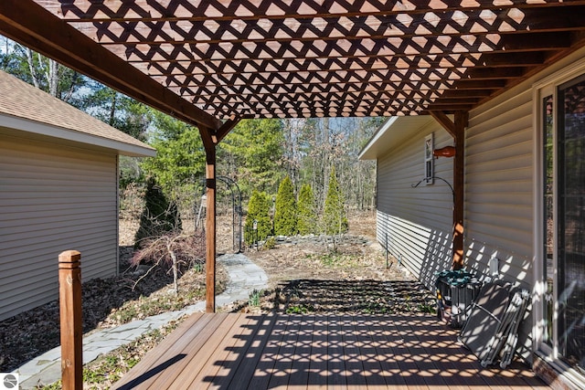 9803 Deer Track Ct, Interlochen, MI 49643 - wooden deck with a patio area