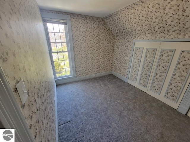 442 E Harris St, Cadillac, MI 49601 - carpeted spare room with wallpapered walls