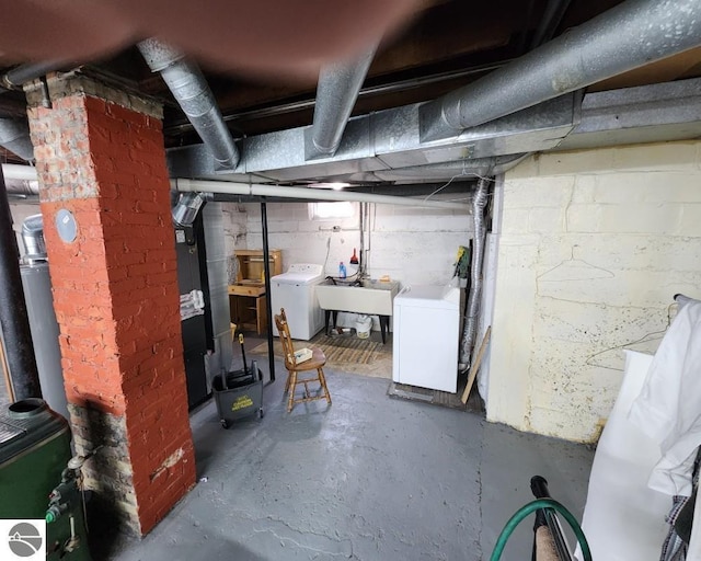 442 E Harris St, Cadillac, MI 49601 - unfinished basement featuring a sink and heating unit