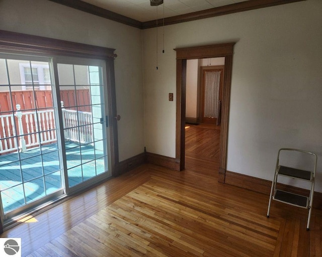 442 E Harris St, Cadillac, MI 49601 - unfurnished room with hardwood / wood-style floors and baseboards