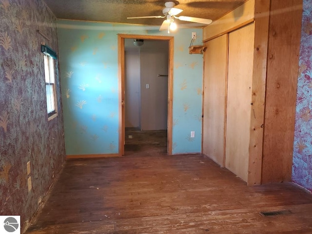 312 S Brown St, Edmore, MI 48829 - spare room featuring wood-type flooring and a ceiling fan