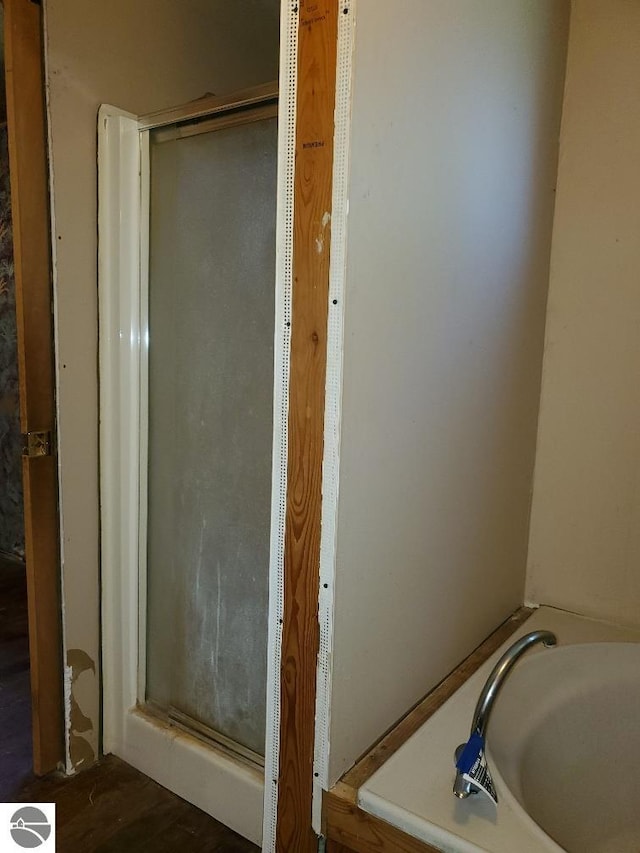 312 S Brown St, Edmore, MI 48829 - full bathroom featuring a stall shower