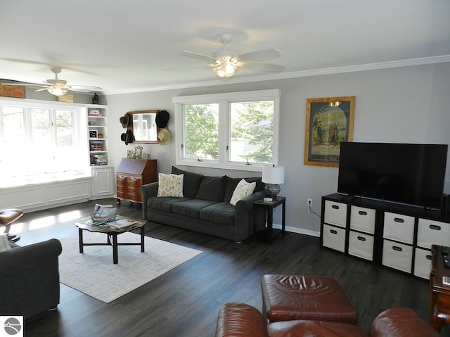 915 N Sunset Shores Dr, Lake Leelanau, MI 49653 - living area with ceiling fan, crown molding, dark wood-type flooring, and baseboards