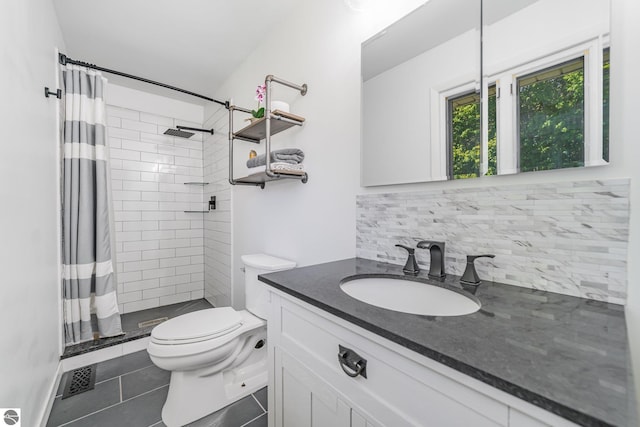 6450 W Lincoln Rd, Elwell, MI 48832 - full bathroom with toilet, decorative backsplash, tile patterned floors, and a stall shower