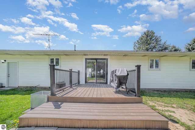 6450 W Lincoln Rd, Elwell, MI 48832 - deck with area for grilling and a yard