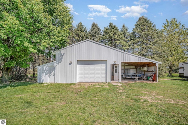 6450 W Lincoln Rd, Elwell, MI 48832 - garage with a detached garage