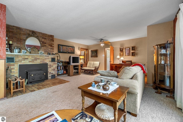 7548 S Dune Hwy, Empire, MI 49630 - living room with carpet, a ceiling fan, and a textured ceiling