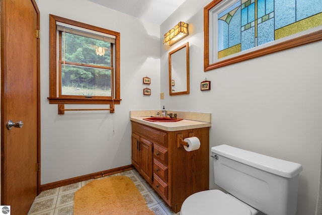 7548 S Dune Hwy, Empire, MI 49630 - half bath with toilet, baseboards, and vanity