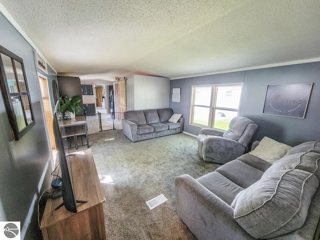 411 S Grover Ave Lot 39, Alma, MI 48801 - living room featuring carpet, crown molding, and a textured ceiling