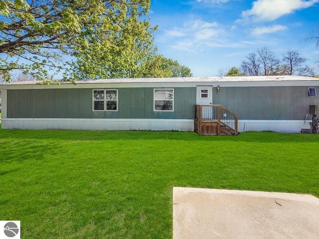411 S Grover Ave Lot 39, Alma, MI 48801 - view of front of property with a front yard