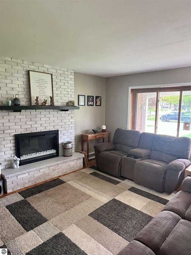 913 Mill St, Alma, MI 48801 - living area featuring a brick fireplace