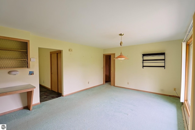 8670 E Pickard Rd, Mount Pleasant, MI 48858 - spare room with carpet flooring and baseboards