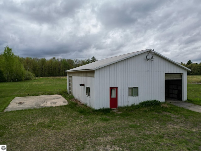 8670 E Pickard Rd, Mount Pleasant, MI 48858 - view of pole building featuring a lawn
