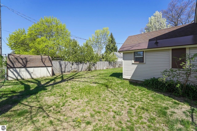 view of yard with a storage unit and an outdoor structure